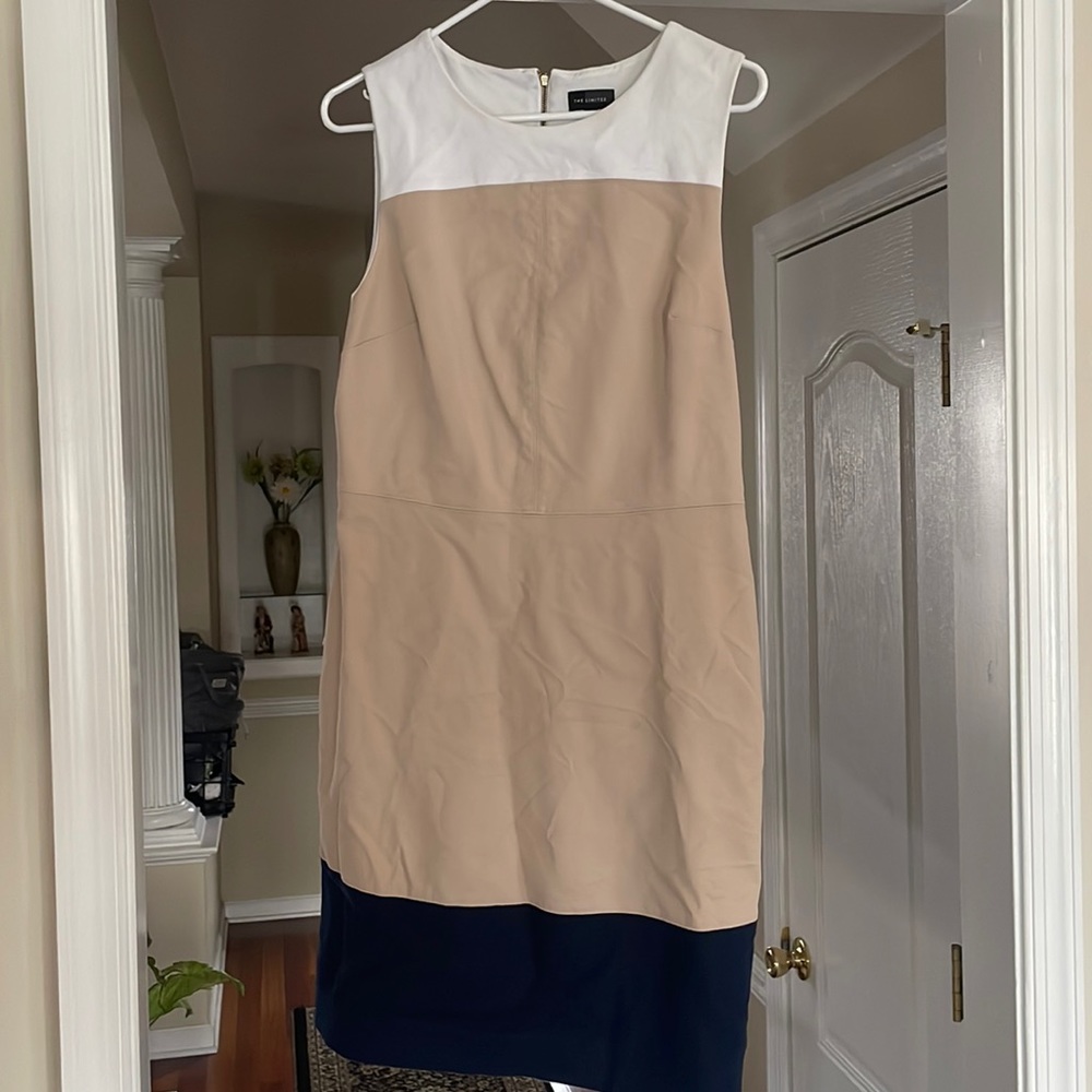 Midi color block dress. Top is white, middle is tan, and bottom is navy blue.